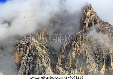 Small cabin of the cable car ascending to the top of Lagazuoi summit, Dolomite Alps, Italy