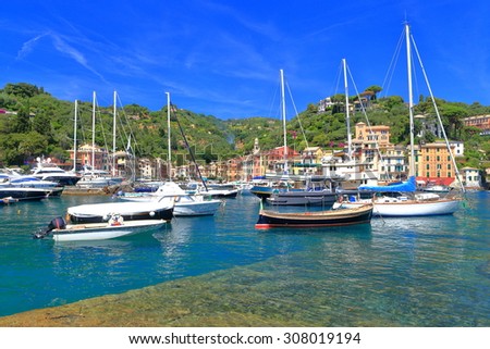 Luxury sail boats inside the harbor of traditional village on the Ligurian, coast, Portofino, Italy