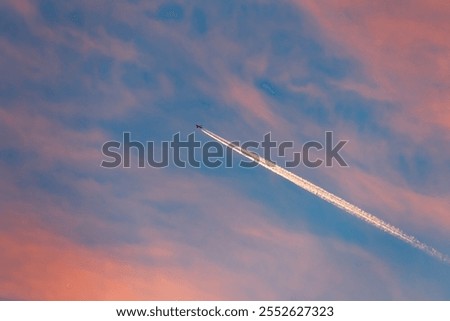 Similar – Foto Bild Ein Kondensstreifen am blauen Himmel und Äste eines blühenden Kirschbaumes lassen von der nächsten Urlaubsreise träumen / Frühling / Urlaubsplanung