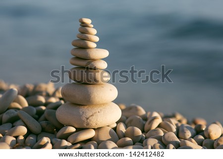 balanced stones on the sea beach
