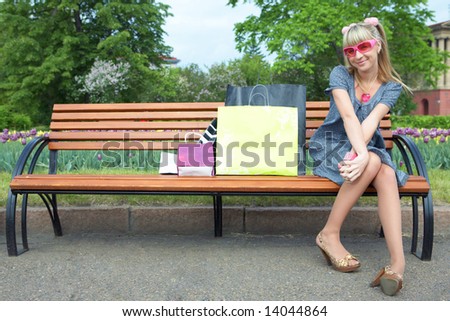 beauty shopping blonde girl with paper bag