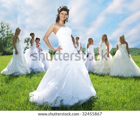 leader bride with groups of bride on green grass