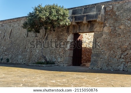 Old military building on the Mallorcan coast in the town of Cala d'Or, Es Forti. on a sunny morning Stock fotó © 