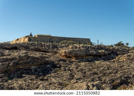 Old military building on the Mallorcan coast in the town of Cala d'Or, Es Forti. on a sunny morning Stock fotó © 