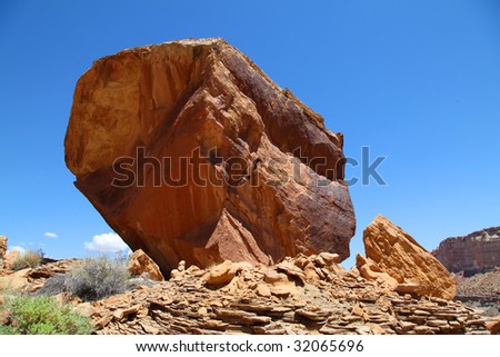 View of red rock formations in San Rafael Swell with blue skys the and clouds