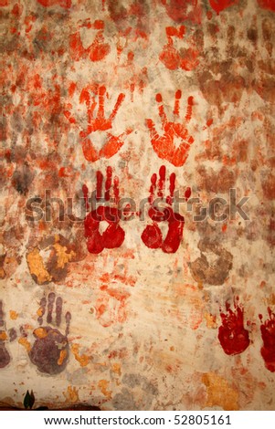 Hand prints on temple wall, India