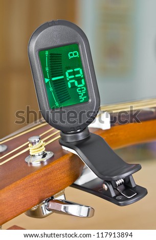 Clip tuner Equipment For tuning  guitar sound.