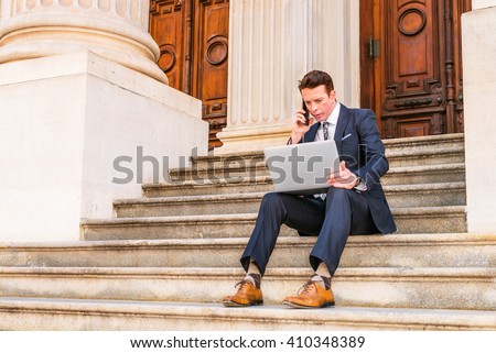 American Businessman traveling, working in New York, dressing in black suit, leather shoes, sitting on stairs outside office, working on laptop computer, calling on phone. Instagram filtered effect.
 Сток-фото © 
