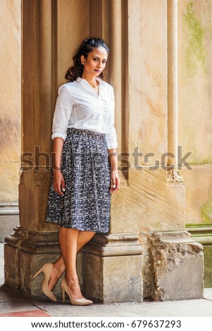 https://image.shutterstock.com/display_pic_with_logo/917021/679637293/stock-photo-portrait-of-young-beautiful-east-indian-american-woman-in-new-york-wearing-white-shirt-black-and-679637293.jpg