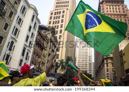 SAO PAULO, BRAZIL - June 17, 2014: Soccer fans during the World Cup Group,during match Brazil and Mexico, in Anhangabau Valley. Sao Paulo, Brazil