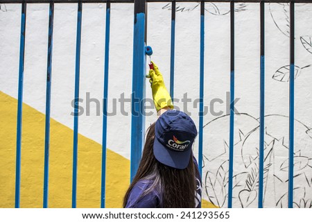 SAO PAULO, BRAZIL, December 03, 2014: task force paints the grid in Sao Paulo, Brazil