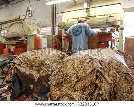 Sao Paulo, Brazil, november 08, 2004. Workers at leather factory perform the work