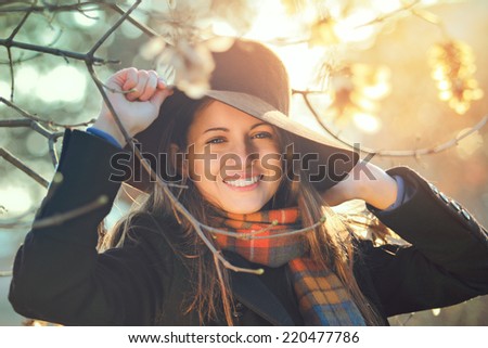 Autumn portrait of an happy girl with beautiful smile