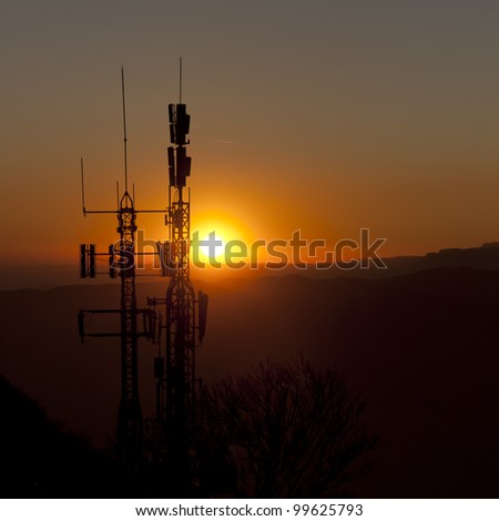 antennas to the light at sunset