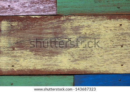 detail of abstract art color wood wall    yellow green blue purple