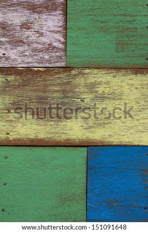 detail of abstract art color wood wall  yellow green blue purple