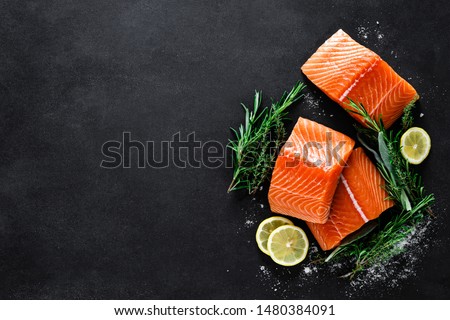 Similar – Image, Stock Photo Raw fish with lemon and herbs