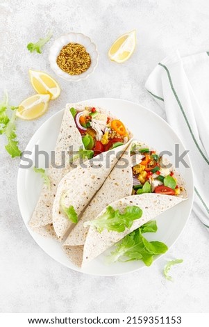 Similar – Foto Bild Gemüsetortilla-Wraps auf grauem Steinhintergrund