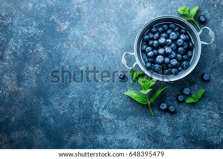 Similar – Image, Stock Photo Fresh organic blueberries in garden