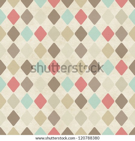 Seamless harlequin pattern on paper texture