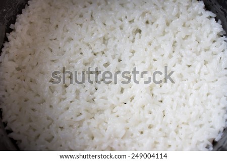 Rice is cooked in a rice cooker