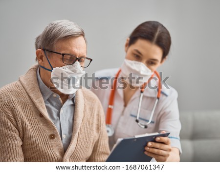 Similar – Image, Stock Photo doctor man wearing protective mask and gloves indoors. Holding an alcohol gel or antibacterial disinfectant. Hygiene and corona virus concept. Covid-19