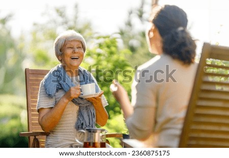 Similar – Image, Stock Photo Relaxed senior woman at home by the window