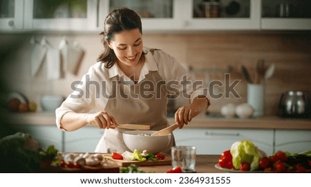 Similar – Foto Bild Frau bereitet Essen in der Küche vor.