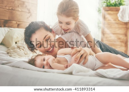 Similar – Image, Stock Photo Mother with cheerful child in the park.