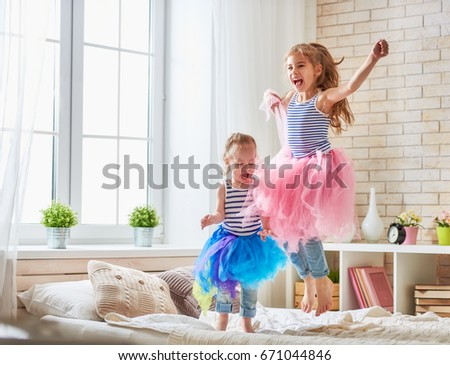 Similar – Image, Stock Photo Little Caucasian Girl in costume of which orange and black color and celebrating Halloween outdoor