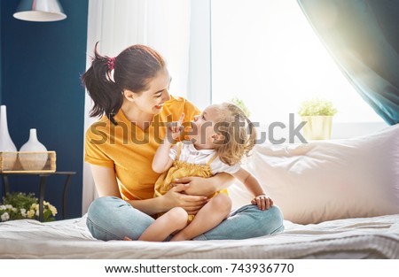 Similar – Image, Stock Photo Mother holding daughter