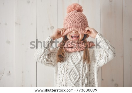 Similar – Image, Stock Photo child wearing a hat and glasses smiling at the camera