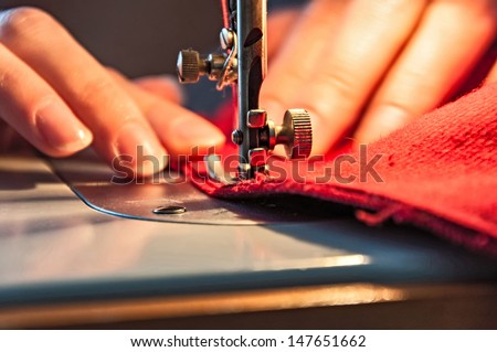 Similar – Image, Stock Photo Sewing machine worked by a seamstress