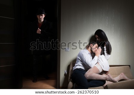 Man arriving home while his wife cheating with another guy