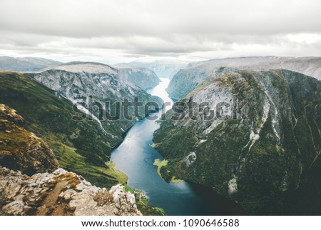 Similar – Image, Stock Photo Breathtaking scenery of sea shore in Santorini