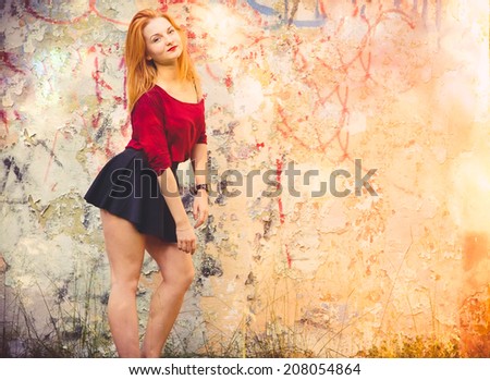 Young Woman model outdoor Urban Street Fashion Lifestyle trendy concept with old painted wall on background
