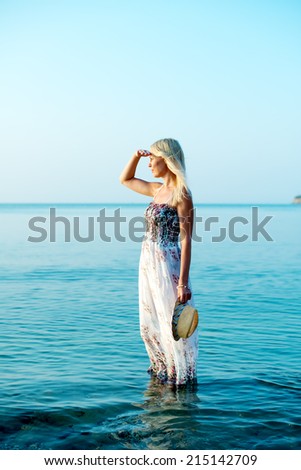 making look younger beautiful girl cost seaborne and peers into distance