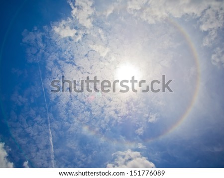 fantastic beautiful sun halo phenomenon with some cloud