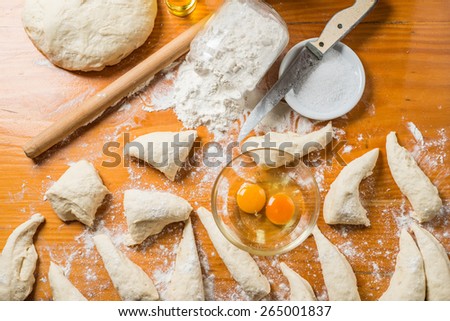 hand made bread dough cut and prepare into bread rolls
