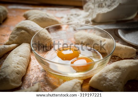Preparation of bread and rolls in the kitchen. Kneading
