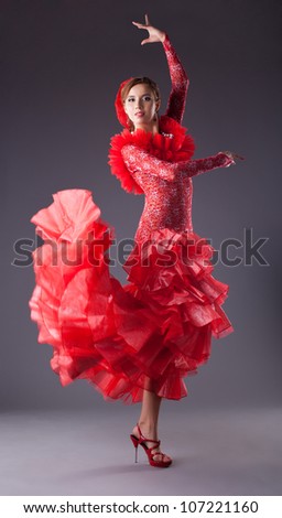 woman flamenco dancer in red costume