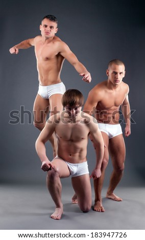 Image of attractive male models advertising briefs