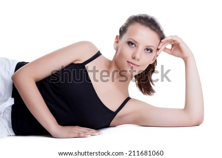 Portrait of pretty young girl in black tank top