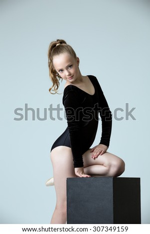 Image of cute sporty girl posing at camera
