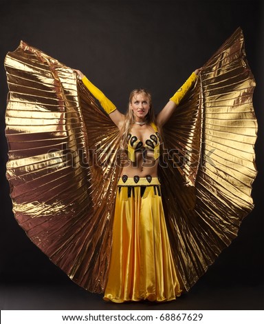 Beauty woman dance with gold wing