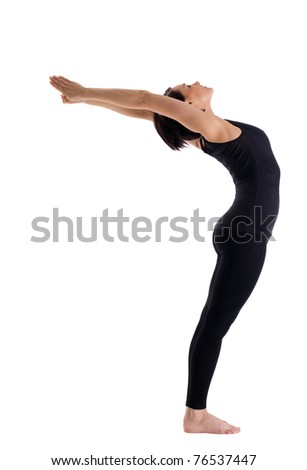woman stand in yoga pose - urdhva hastanasana