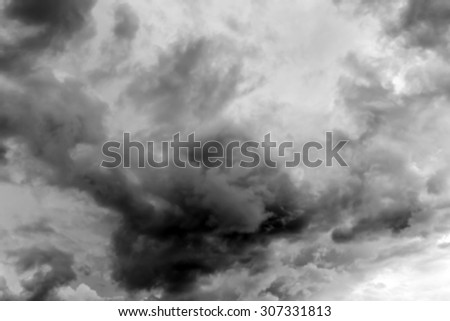 Dramatic and dark sky with storm clouds.Blur or Defocus image.