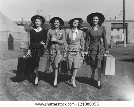 Similar – Image, Stock Photo Delighted female friends walking along street