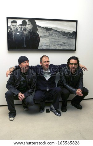 The Edge, Anton Corbijn, Bono at Anton Corbijn photo exhibition celebrating 22 years of U2, Stellan Holm Gallery, New York, NY, October 09, 2005