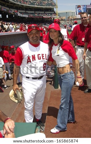 Steve Soliz, Eva Longoria make an appearance to throw out the first pitch at the Los Angeles Angels baseball game against the New York Yankees, Angel Stadium, Anaheim, CA, Sunday, July 24, 2005